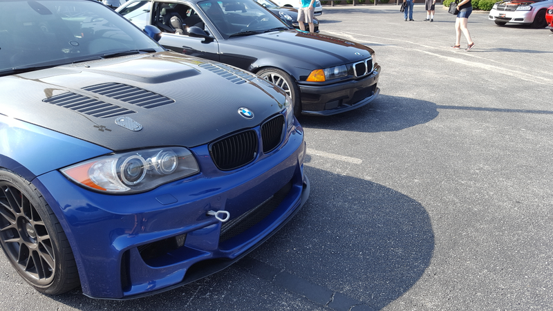 This gorgeous 1 series next to a supercharged E36 M3
